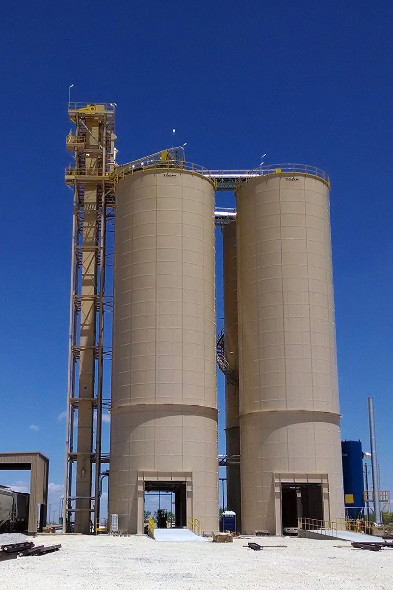 Drive-thru tank configuration for truck loading